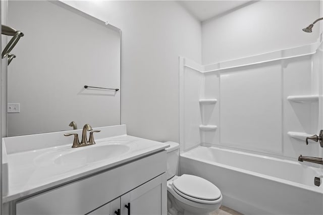 313 Foxglove Way, Mcdonough, GA 30253 - bathroom with vanity, toilet, and washtub / shower combination