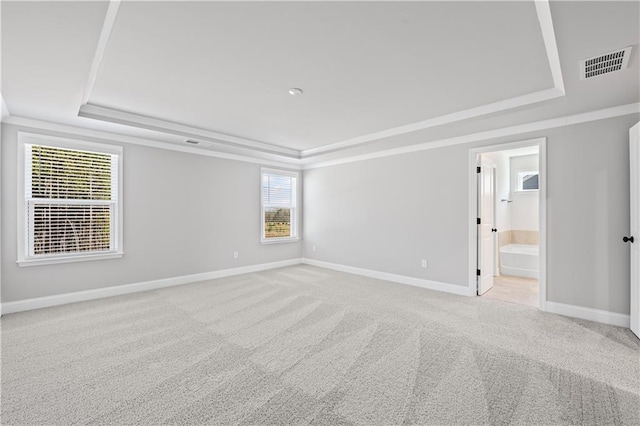 313 Foxglove Way, Mcdonough, GA 30253 - unfurnished room featuring a tray ceiling, visible vents, and baseboards