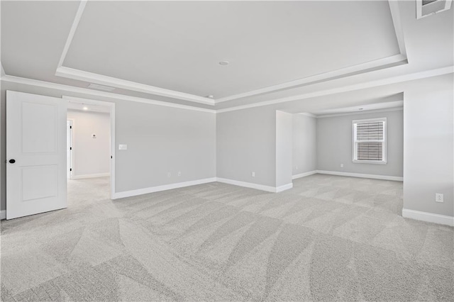 313 Foxglove Way, Mcdonough, GA 30253 - unfurnished room with baseboards, a raised ceiling, visible vents, and light colored carpet