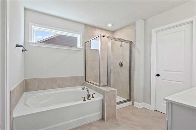 313 Foxglove Way, Mcdonough, GA 30253 - bathroom with a stall shower, vanity, a wealth of natural light, and a bath