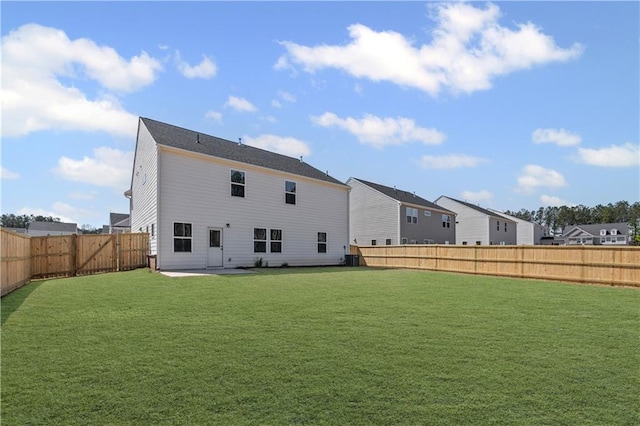 313 Foxglove Way, Mcdonough, GA 30253 - rear view of property with a fenced backyard, a patio area, and a yard