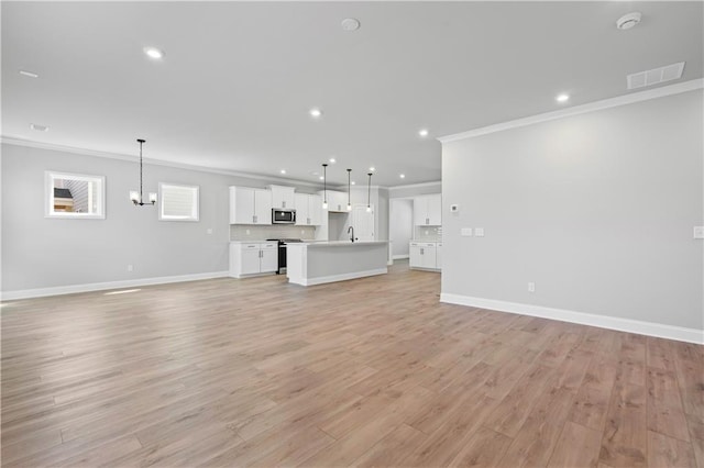313 Foxglove Way, Mcdonough, GA 30253 - unfurnished living room featuring recessed lighting, ornamental molding, and visible vents