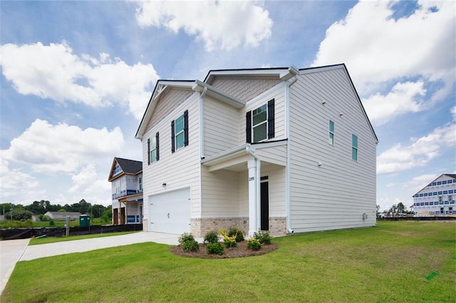 view of side of property with driveway, brick siding, a lawn, and an attached garage
