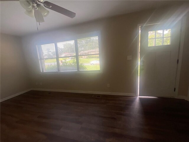 1870 Glen Echo Dr, Decatur, GA 30032 - unfurnished room with ceiling fan, a healthy amount of sunlight, and dark hardwood / wood-style flooring