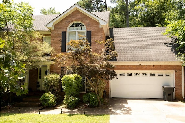 1473 Wildwood Way, Hampton, GA 30228 - ranch-style house with roof with shingles, brick siding, concrete driveway, and an attached garage