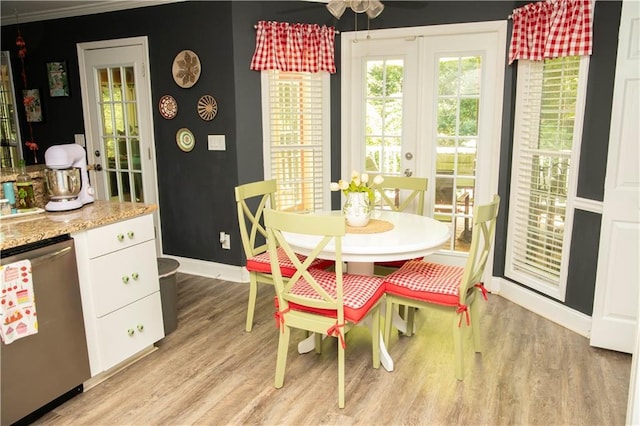 1473 Wildwood Way, Hampton, GA 30228 - dining area featuring light wood-style flooring