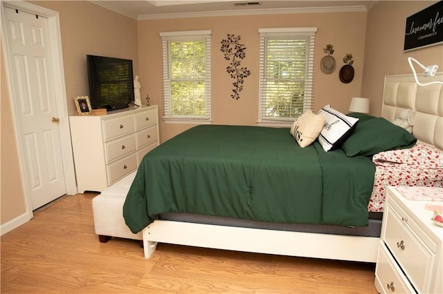 1473 Wildwood Way, Hampton, GA 30228 - bedroom with ornamental molding and light wood-style floors