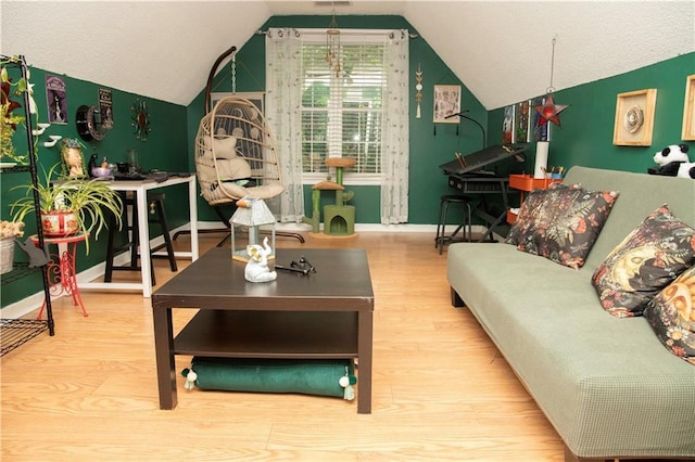 1473 Wildwood Way, Hampton, GA 30228 - living area featuring wood finished floors and vaulted ceiling