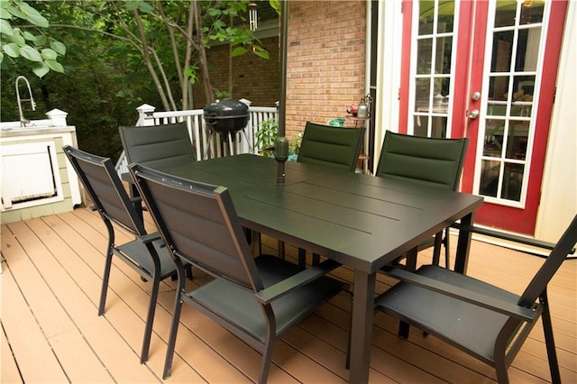 1473 Wildwood Way, Hampton, GA 30228 - wooden terrace featuring outdoor dining area, french doors, and grilling area