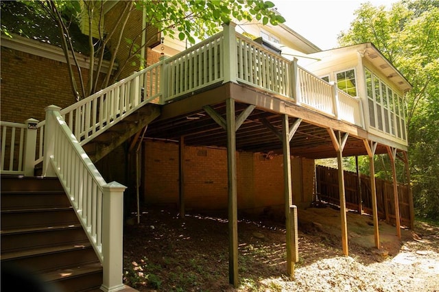 1473 Wildwood Way, Hampton, GA 30228 - view of home's exterior with stairs, brick siding, and a wooden deck