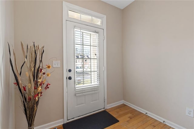 doorway to outside featuring light hardwood / wood-style flooring