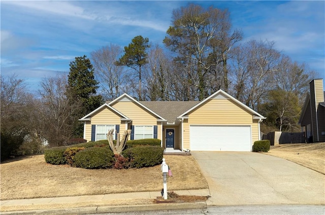 ranch-style house featuring a garage