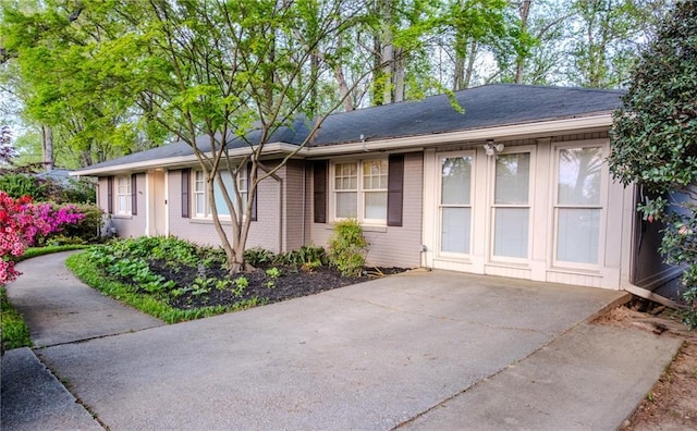 view of front of home with brick siding