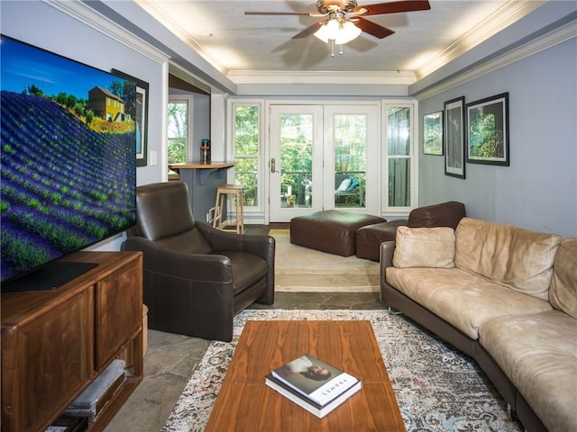 interior space featuring a ceiling fan and crown molding