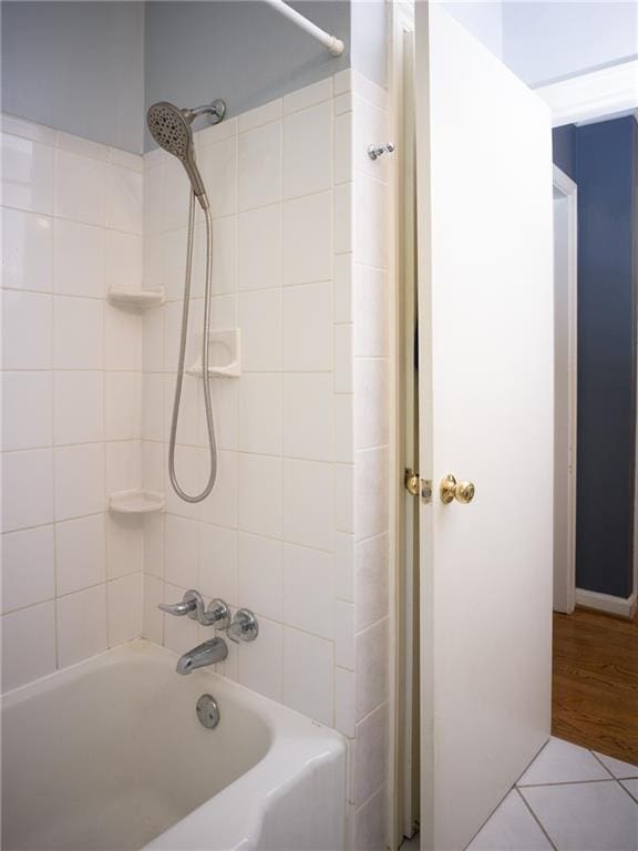 full bathroom with tile patterned flooring and shower / bathing tub combination