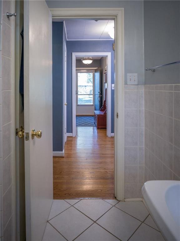 bathroom featuring tile walls and tile patterned floors