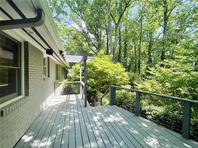 wooden deck with a pergola