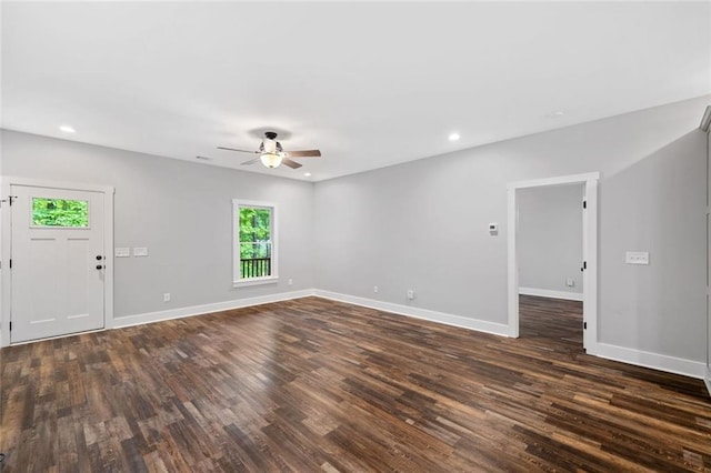 unfurnished living room featuring ceiling fan, dark wood-style floors, baseboards, and recessed lighting