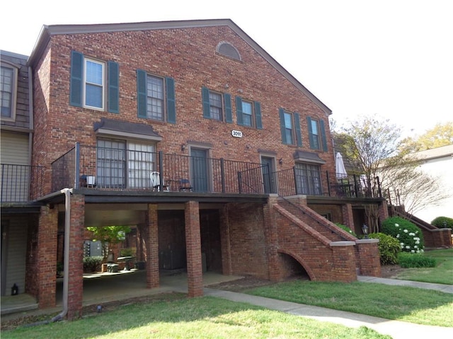 3091 Colonial Way Unit B4, Atlanta, GA 30341 - back of house with brick siding and stairs