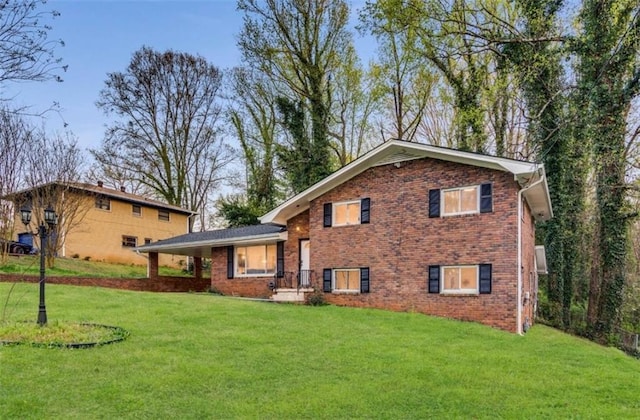 view of side of property featuring a porch and a lawn