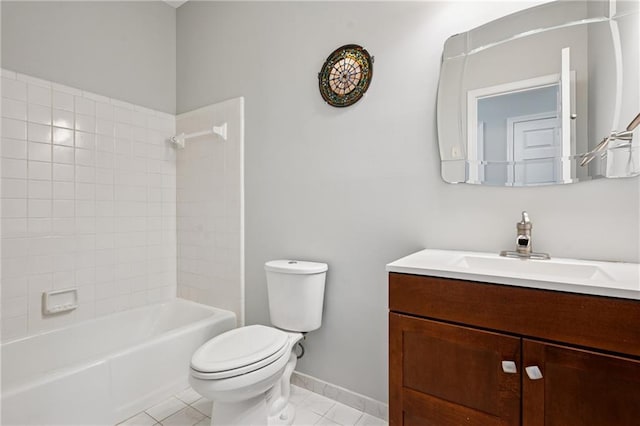 bathroom with tile patterned flooring, tub / shower combination, baseboards, toilet, and vanity