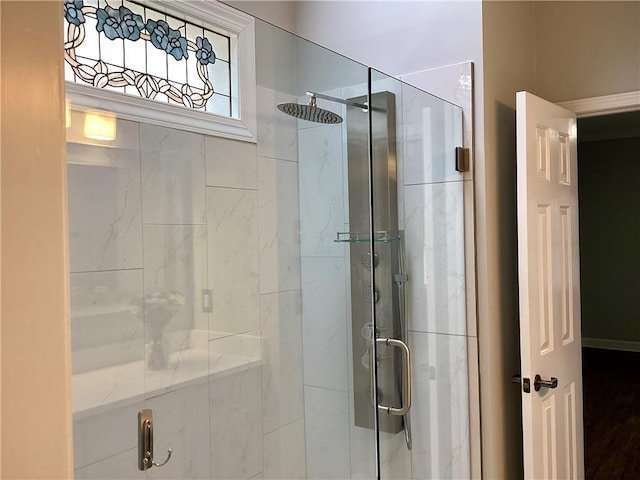 full bathroom featuring a shower stall