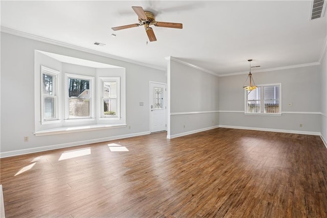 unfurnished living room with visible vents, baseboards, and dark wood-style floors