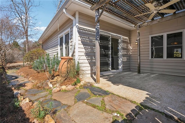 exterior space with a patio area and a pergola