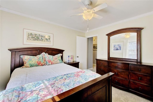 bedroom featuring light carpet, crown molding, and ceiling fan