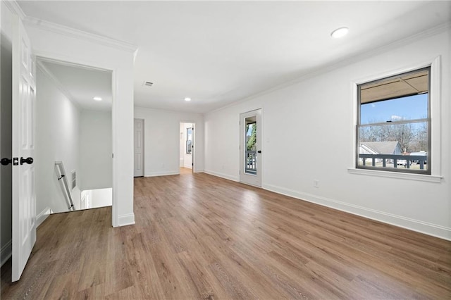 unfurnished room with recessed lighting, baseboards, crown molding, and wood finished floors