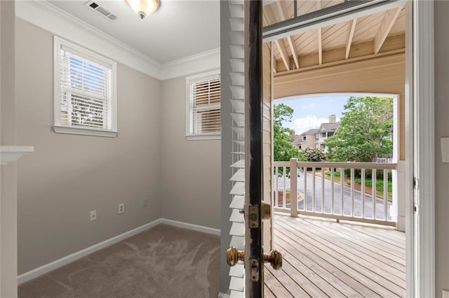 426 Pembrooke Cir Unit 426, Alpharetta, GA 30004 - doorway featuring baseboards, ornamental molding, and carpet