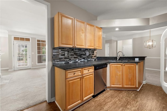 426 Pembrooke Cir Unit 426, Alpharetta, GA 30004 - kitchen with stainless steel dishwasher, a sink, baseboards, tasteful backsplash, and ornamental molding