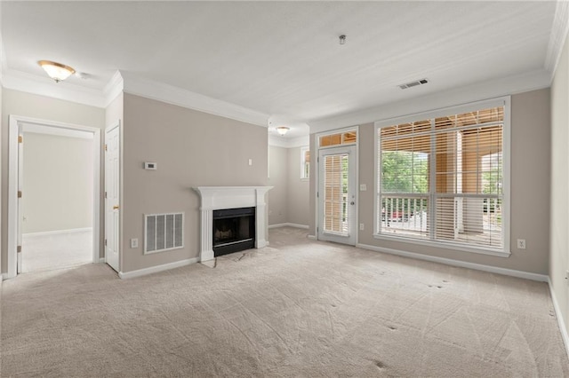 426 Pembrooke Cir Unit 426, Alpharetta, GA 30004 - unfurnished living room featuring ornamental molding, carpet flooring, a fireplace with flush hearth, and baseboards