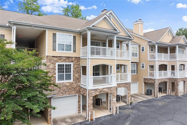 426 Pembrooke Cir Unit 426, Alpharetta, GA 30004 - view of property featuring central AC unit