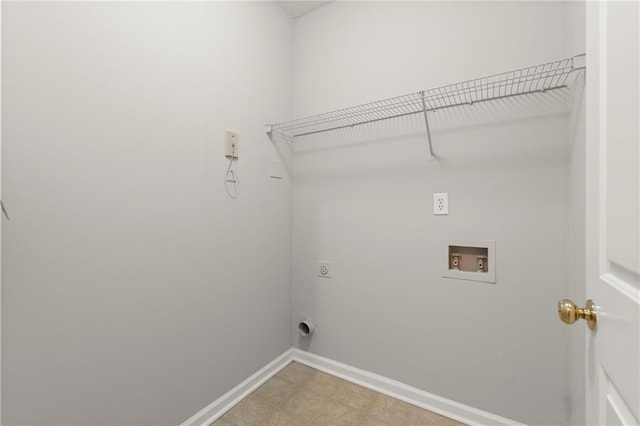 426 Pembrooke Cir Unit 426, Alpharetta, GA 30004 - laundry room with electric dryer hookup, baseboards, and washer hookup
