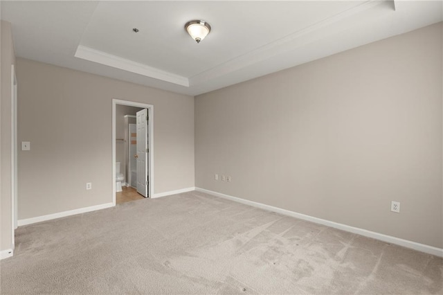426 Pembrooke Cir Unit 426, Alpharetta, GA 30004 - empty room with a raised ceiling, light carpet, and baseboards