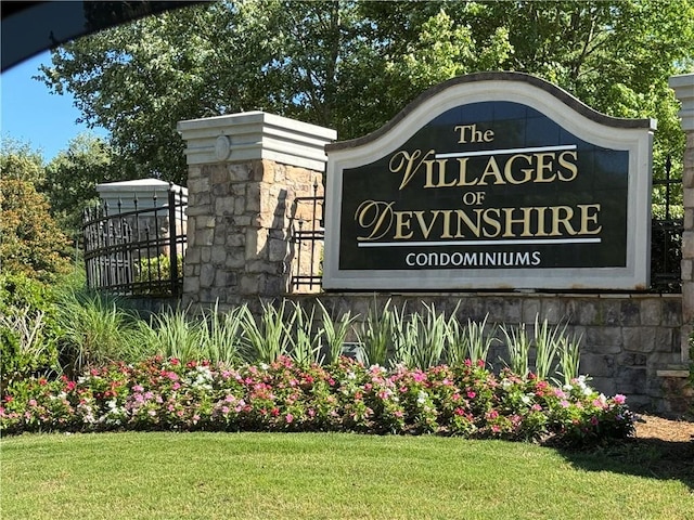 426 Pembrooke Cir Unit 426, Alpharetta, GA 30004 - community / neighborhood sign featuring a lawn