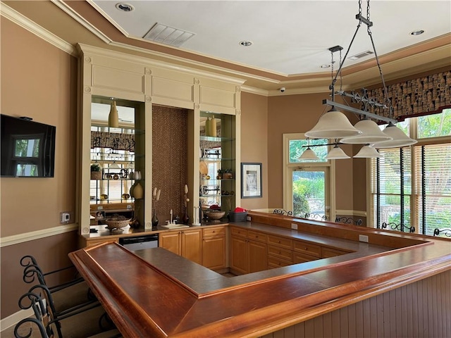 426 Pembrooke Cir Unit 426, Alpharetta, GA 30004 - bar area with ornamental molding, a sink, decorative light fixtures, and dishwashing machine