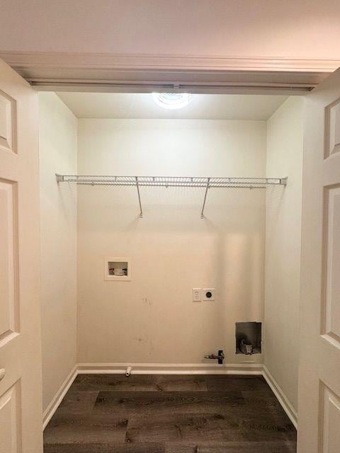 laundry room featuring gas dryer hookup, hookup for an electric dryer, hookup for a washing machine, and hardwood / wood-style floors