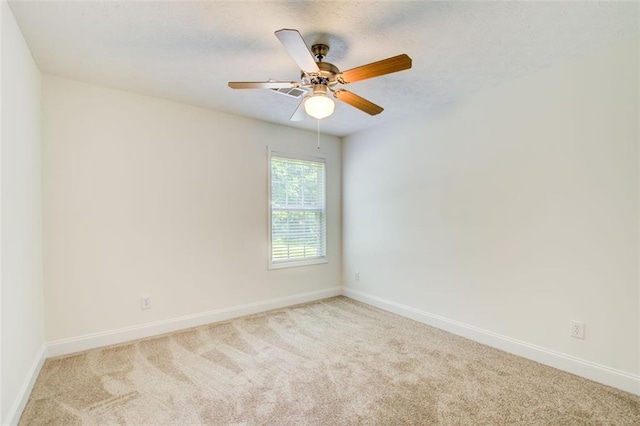 221 Glenview Trl, Griffin, GA 30224 - carpeted empty room with baseboards and a ceiling fan