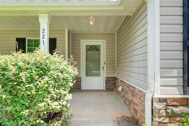 221 Glenview Trl, Griffin, GA 30224 - doorway to property featuring covered porch
