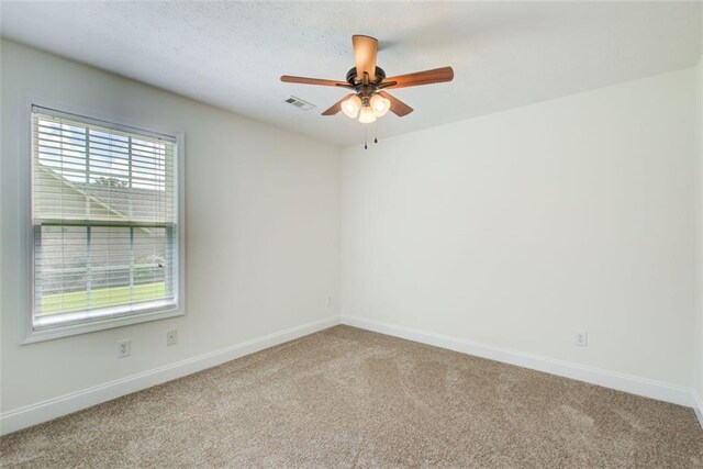 221 Glenview Trl, Griffin, GA 30224 - carpeted empty room featuring baseboards and ceiling fan