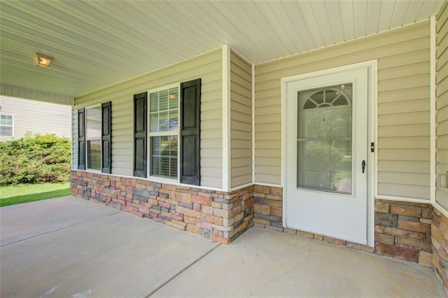 221 Glenview Trl, Griffin, GA 30224 - property entrance with stone siding and a porch