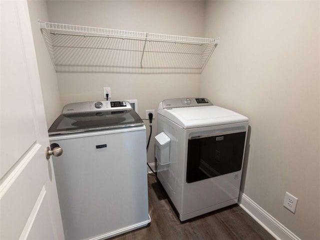 360 Hayden Cir, Woodstock, GA 30189 - laundry area with washing machine and dryer, dark wood-type flooring, and baseboards