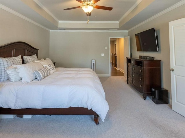 360 Hayden Cir, Woodstock, GA 30189 - bedroom with a tray ceiling, light colored carpet, ornamental molding, ceiling fan, and baseboards