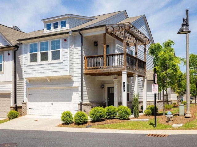 360 Hayden Cir, Woodstock, GA 30189 - view of property featuring a balcony, a garage, driveway, brick siding, and a pergola