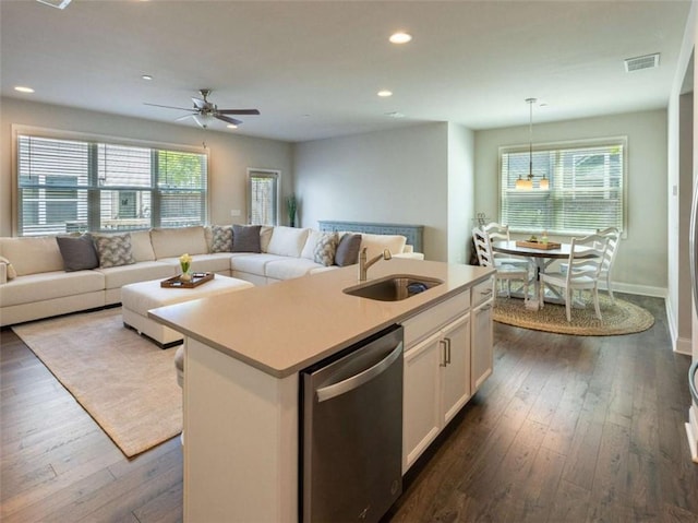 360 Hayden Cir, Woodstock, GA 30189 - kitchen featuring a sink, stainless steel dishwasher, open floor plan, dark wood-style flooring, and light countertops