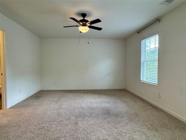 1606 Larkspur Trl, Conyers, GA 30012 - carpeted spare room with a ceiling fan and baseboards