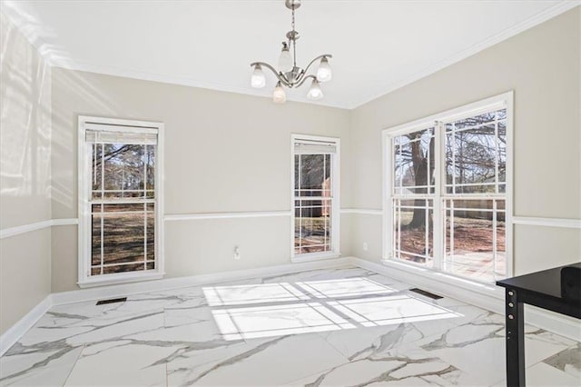 unfurnished dining area with a notable chandelier, visible vents, baseboards, marble finish floor, and ornamental molding