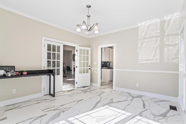 interior space with french doors, crown molding, marble finish floor, and baseboards